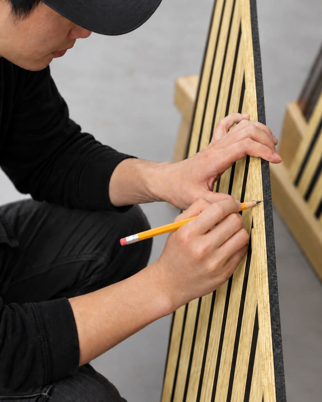 Use a fine-tooth saw to cut the panel along the marked line.